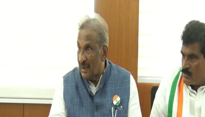 k j george